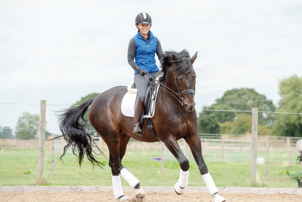 Sophie Wells riding an exercise to engage horse