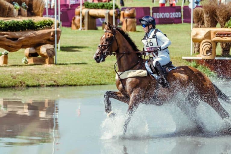 Laura Collett and London 52 storm the cross-country to finish within the time, going into the showjumping in provisional bronze medal position