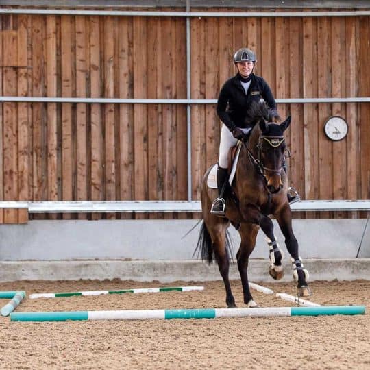 Emily King riding an exercise to help with corners