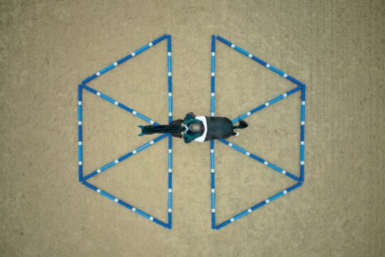 Spider web pole layout for horse riding